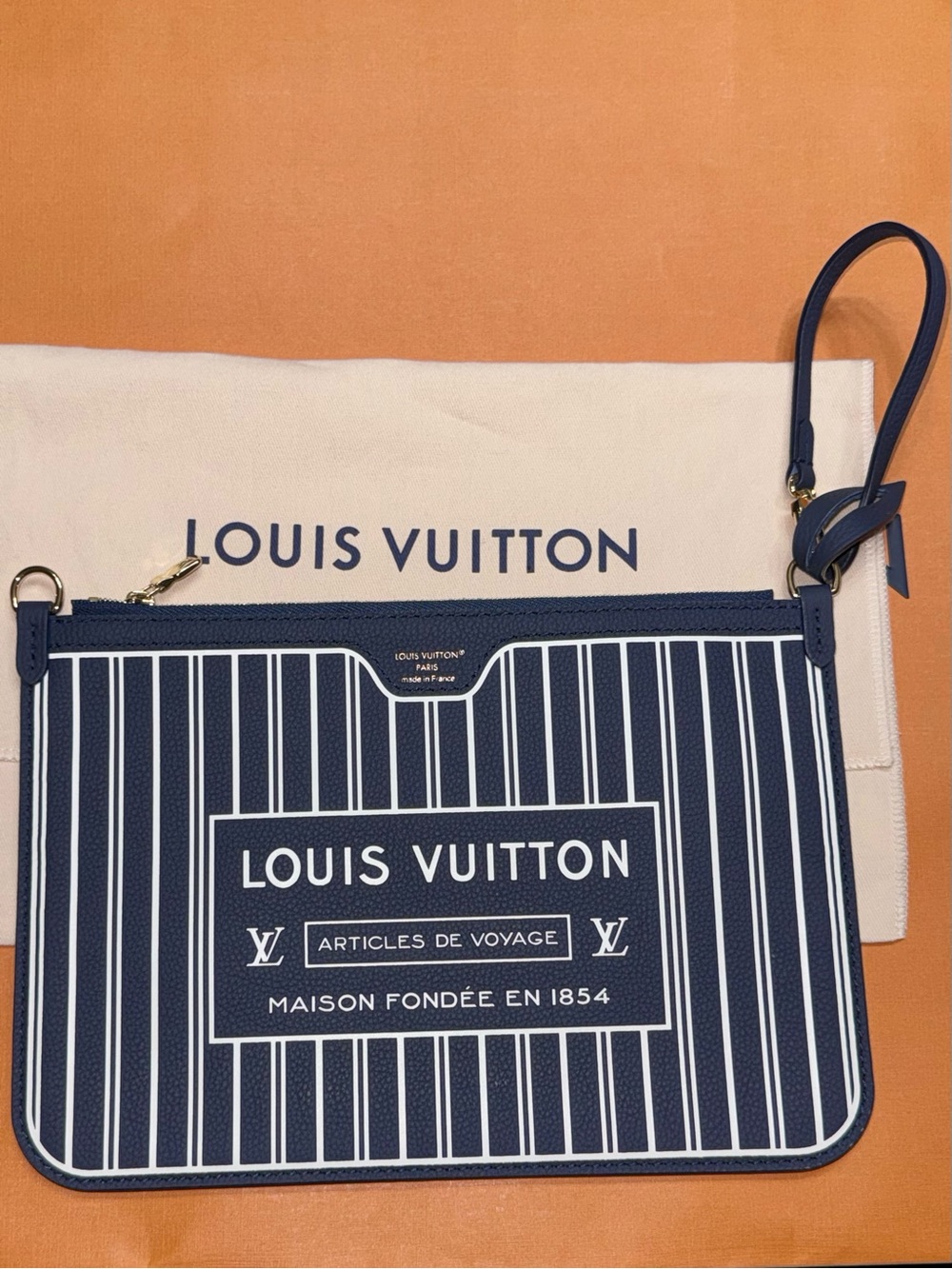 Louis Vuitton Reversible Inside Out zipped pouch monogram / Navy stripe